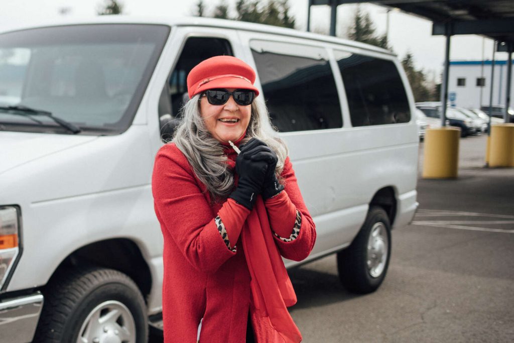 Mary Toews in front of a van